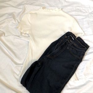 Off white shirt, blue jeans